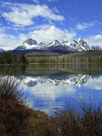 The Sawtooth Mountains reflected in a lake near Stanley, Idaho